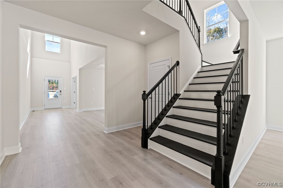 12812 Lonan Avenue Chesterfield, VA 23838 - Photo 9 of 49 a view of a hallway with wooden floor and entryway