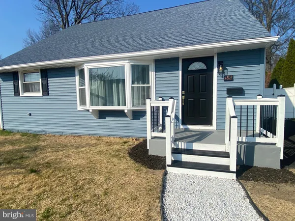 a front view of a house with a porch