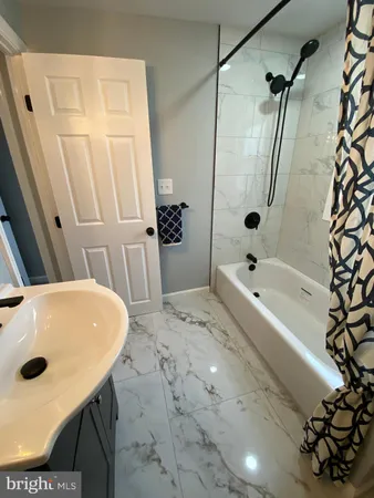 a bathroom with a sink and a tub
