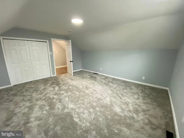 an empty room with natural light
