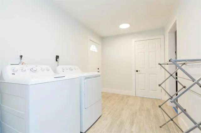 a utility room with dryer and washer