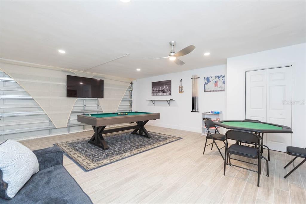 1613 Druid Road Clearwater, FL 33756 - Photo 37 of 47 a living room with furniture and a wooden floor