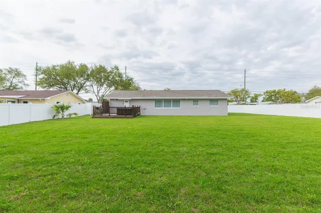 a front view of house with garden