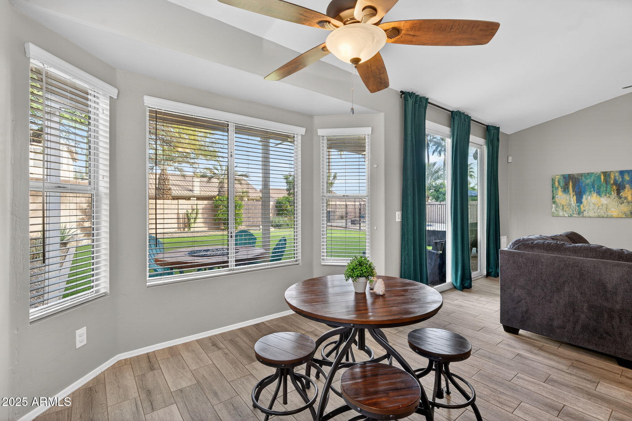 15427 South 16th Avenue Phoenix, AZ 85045 - Photo 11 of 53 a living room with furniture and a large window