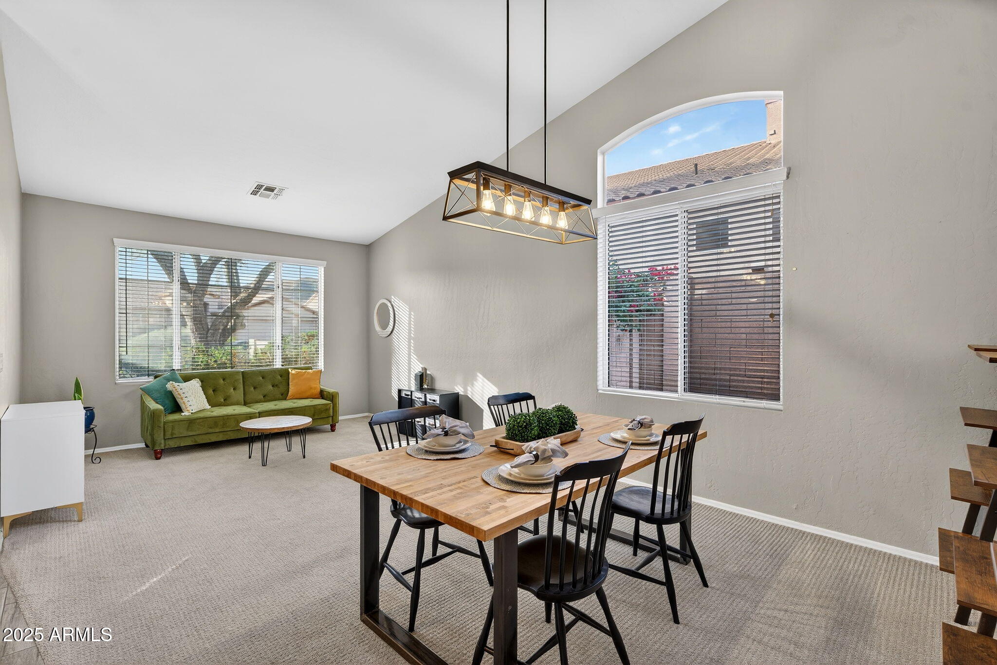 15427 South 16th Avenue Phoenix, AZ 85045 - Photo 15 of 53 a living room with furniture and a large window