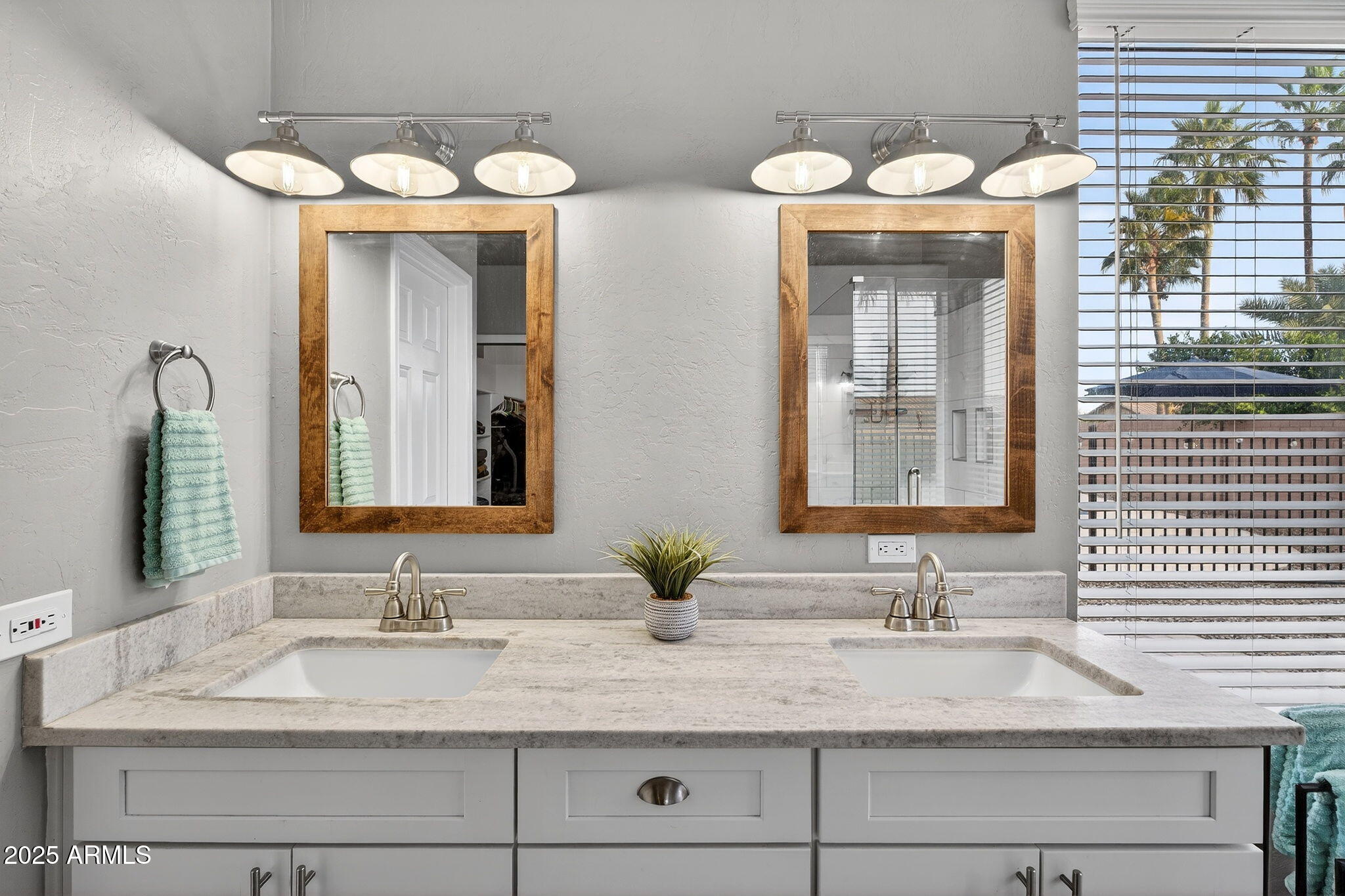 15427 South 16th Avenue Phoenix, AZ 85045 - Photo 22 of 53 a bathroom with double vanity sinks and a mirror