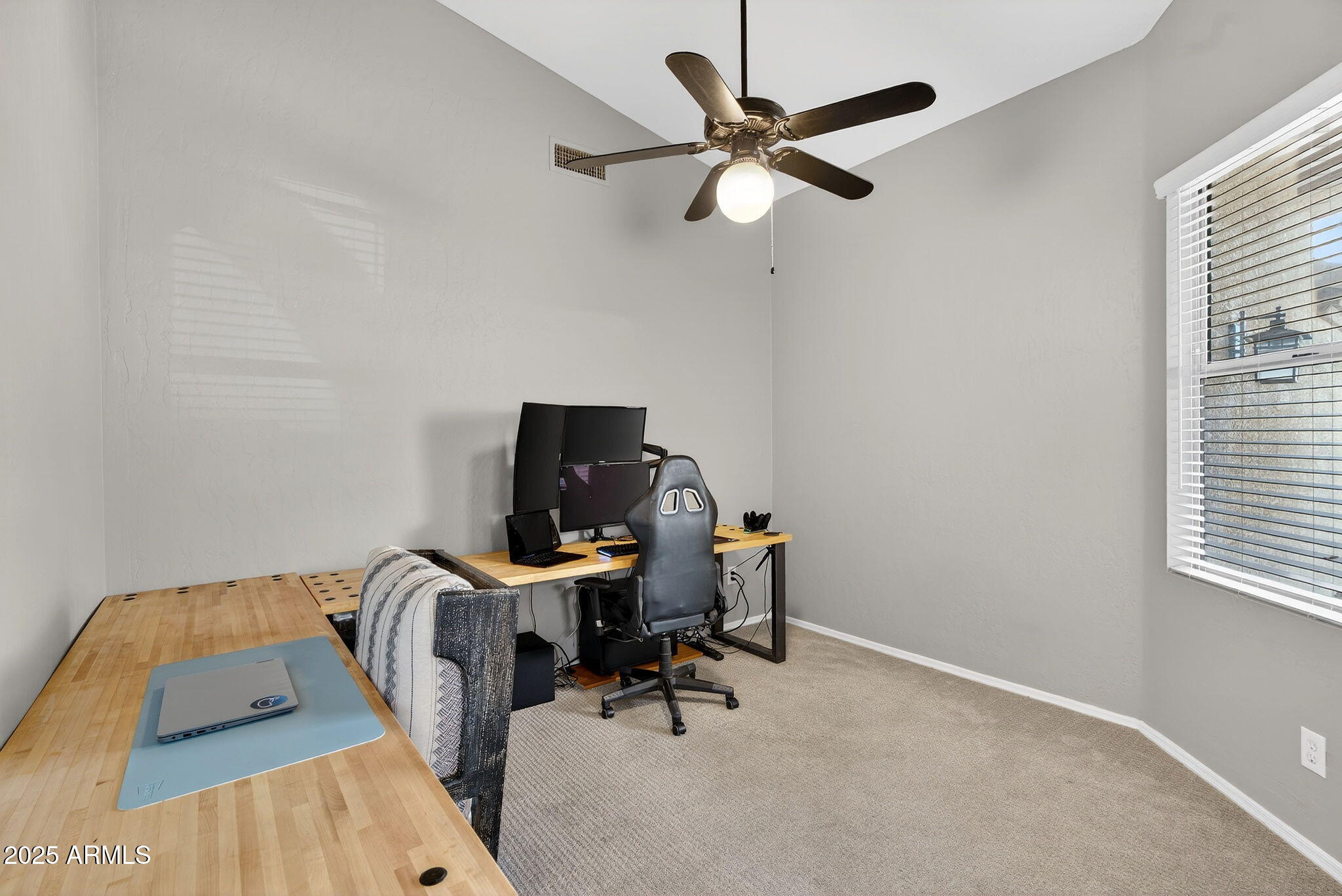 15427 South 16th Avenue Phoenix, AZ 85045 - Photo 28 of 53 a view of a workspace with furniture and a window
