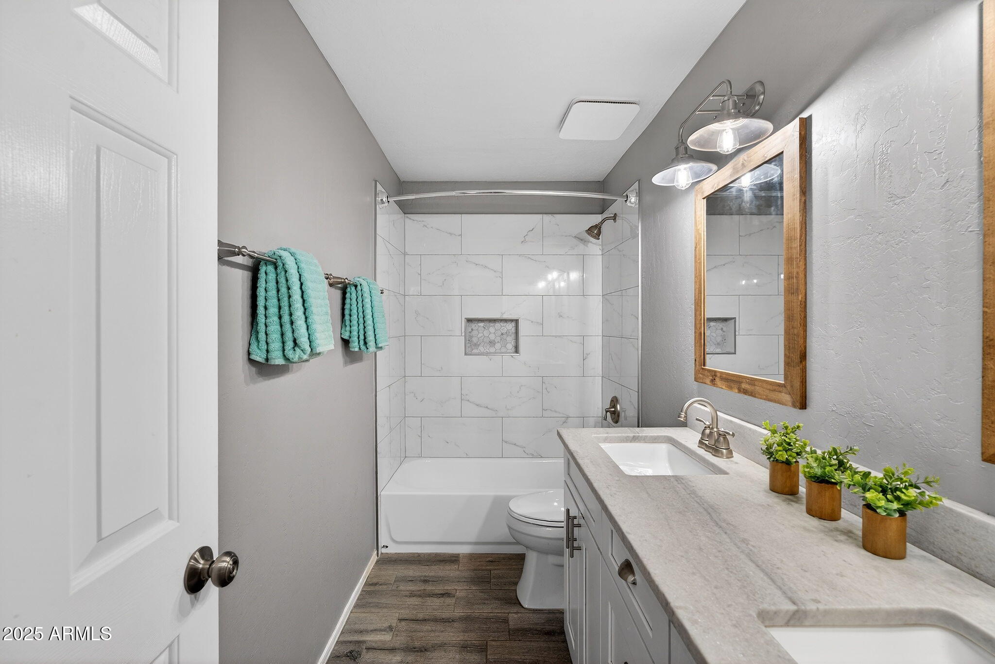 15427 South 16th Avenue Phoenix, AZ 85045 - Photo 30 of 53 a bathroom with a granite countertop sink a toilet and shower