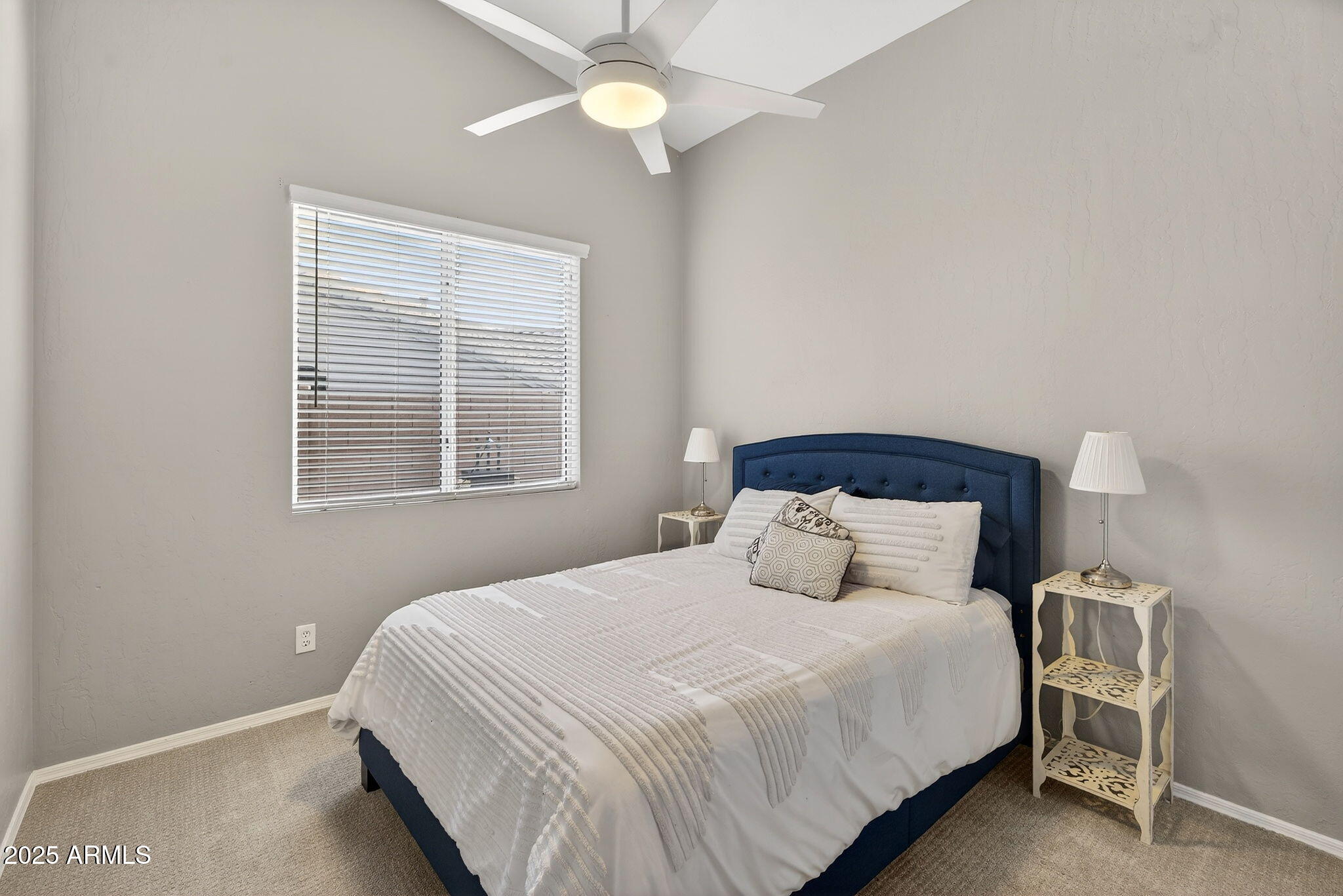 15427 South 16th Avenue Phoenix, AZ 85045 - Photo 35 of 53 a bedroom with a bed and a window