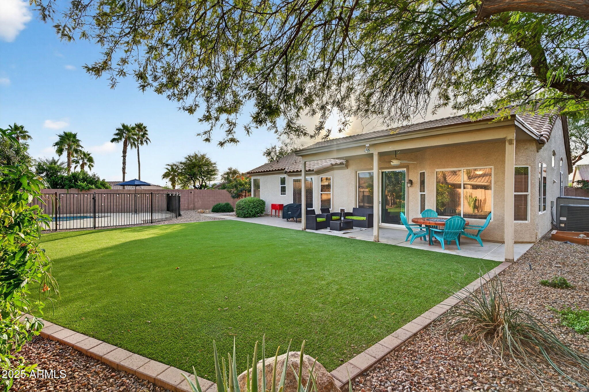 15427 South 16th Avenue Phoenix, AZ 85045 - Photo 38 of 53 a view of a house with backyard porch and sitting area