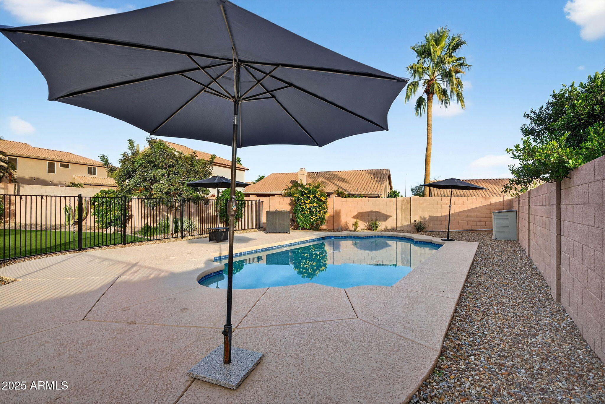 15427 South 16th Avenue Phoenix, AZ 85045 - Photo 41 of 53 a view of a backyard with a patio