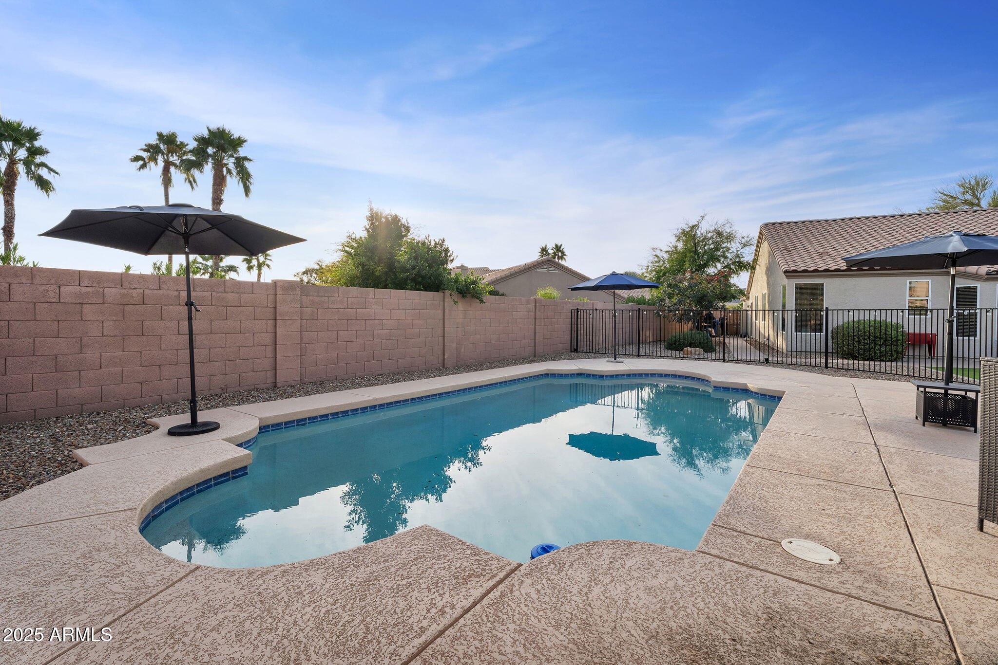 15427 South 16th Avenue Phoenix, AZ 85045 - Photo 44 of 53 a swimming pool with a yard