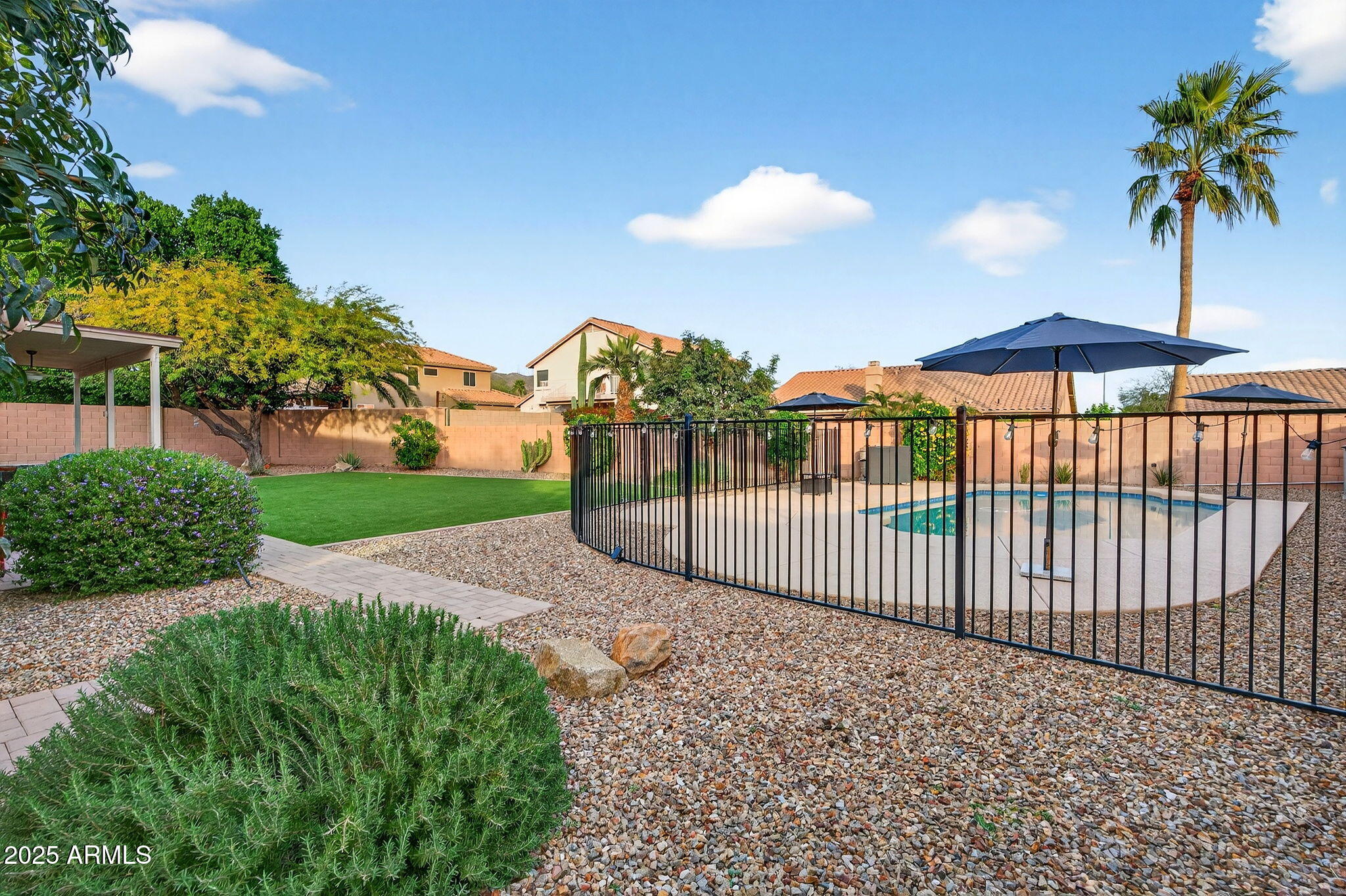 15427 South 16th Avenue Phoenix, AZ 85045 - Photo 49 of 53 a view of a backyard with a garden