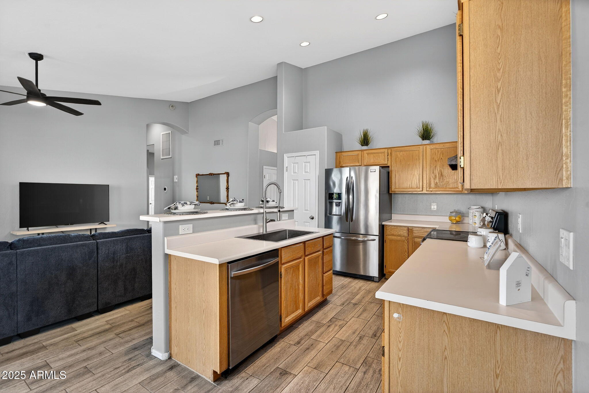 15427 South 16th Avenue Phoenix, AZ 85045 - Photo 5 of 53 a kitchen with a sink stove and refrigerator