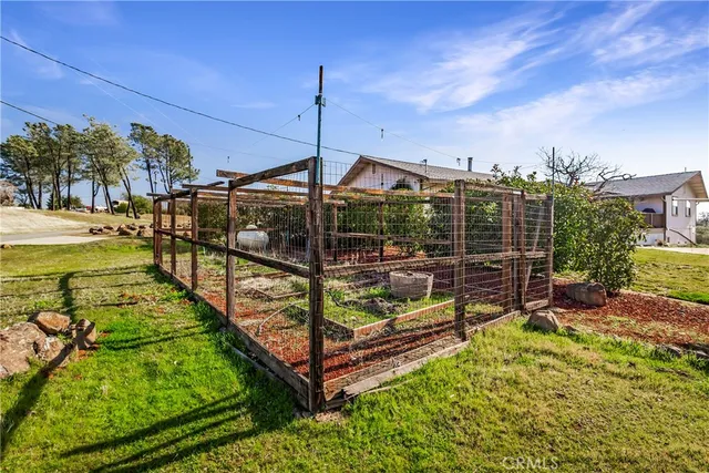 a view of a swimming pool and an outdoor seating