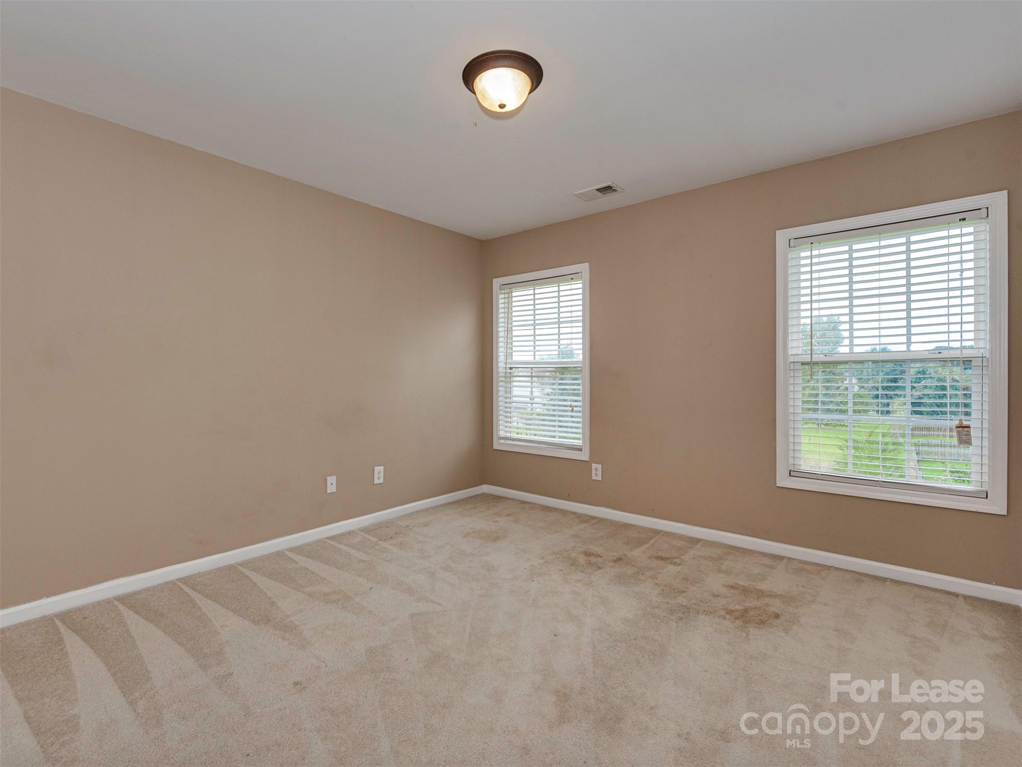 5607 Fulton Ridge Drive Indian Trail, NC 28079 - Photo 13 of 27 a view of an empty room with a window