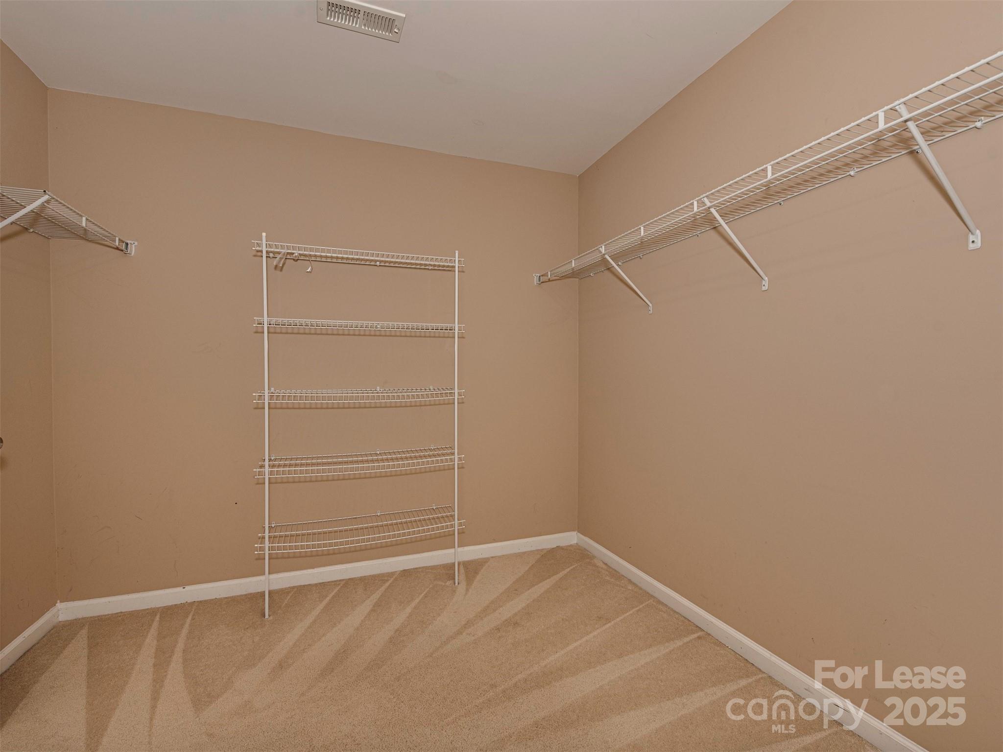 5607 Fulton Ridge Drive Indian Trail, NC 28079 - Photo 20 of 27 a view of an empty walk in closet
