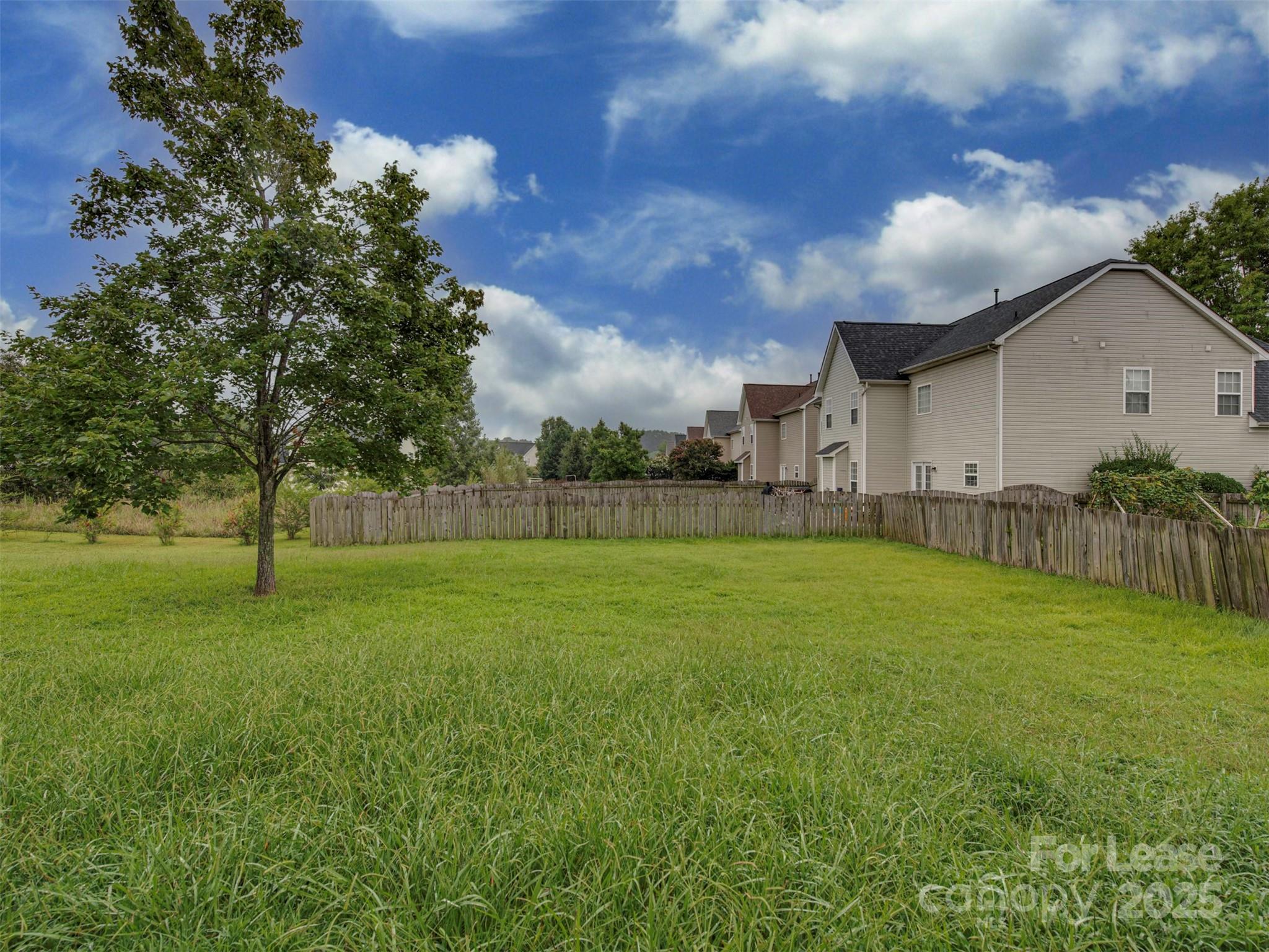 5607 Fulton Ridge Drive Indian Trail, NC 28079 - Photo 22 of 27 a view of a backyard