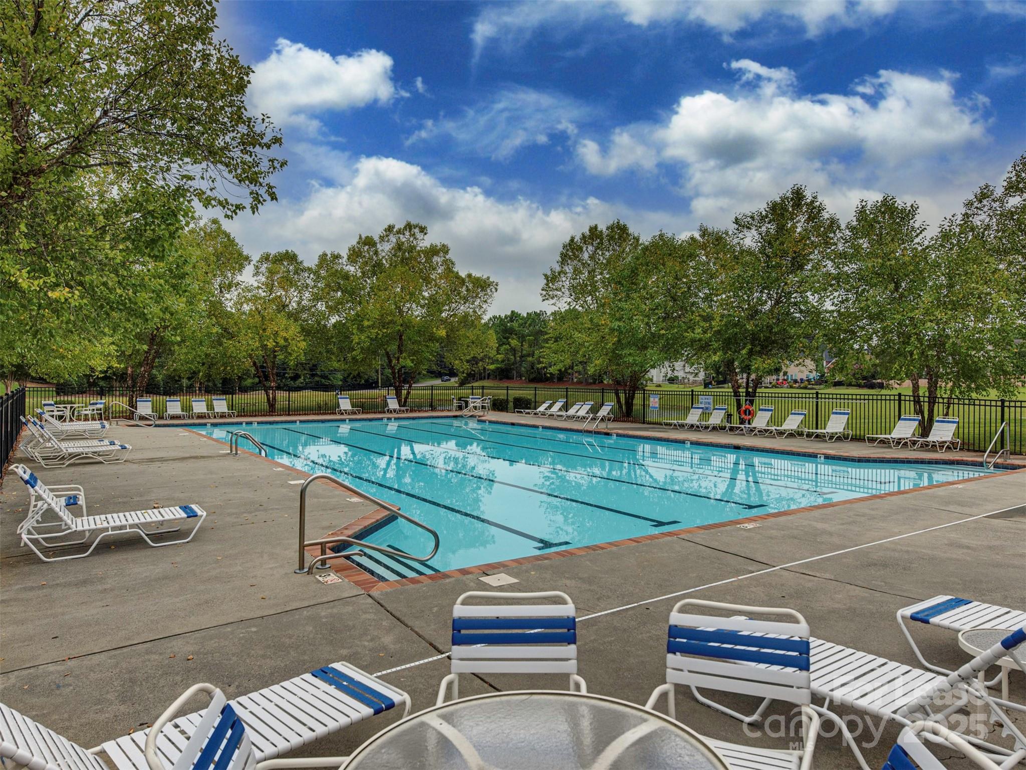 5607 Fulton Ridge Drive Indian Trail, NC 28079 - Photo 25 of 27 a view of a yard with outdoor seating