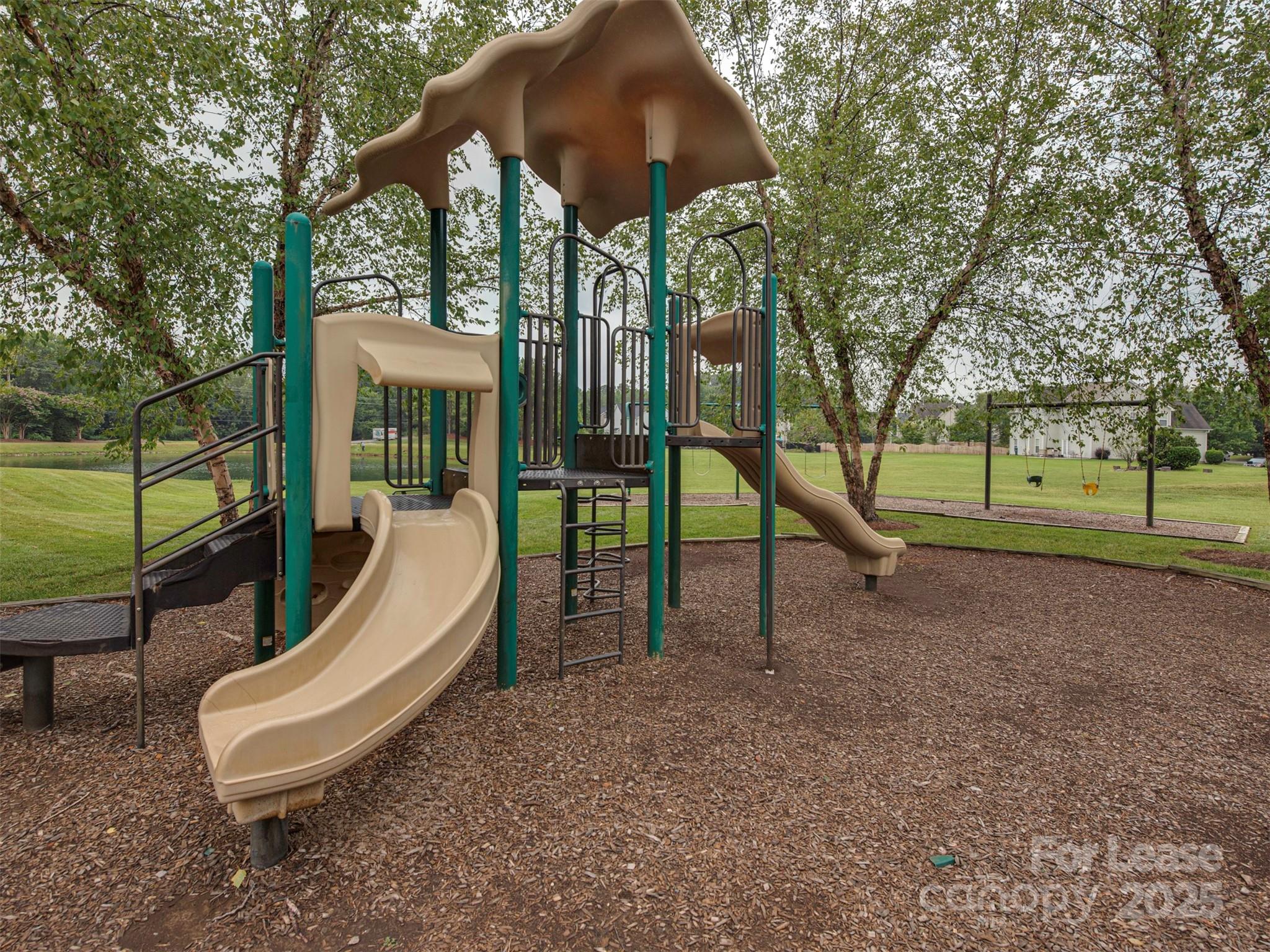 5607 Fulton Ridge Drive Indian Trail, NC 28079 - Photo 27 of 27 a view of a park with slide