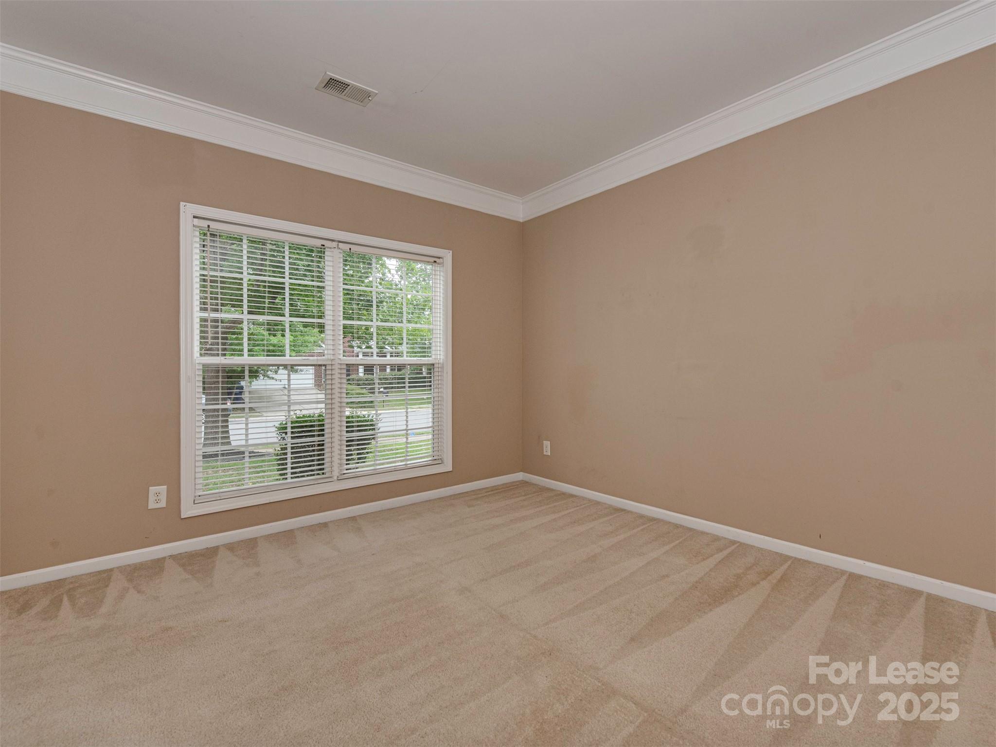 5607 Fulton Ridge Drive Indian Trail, NC 28079 - Photo 4 of 27 a view of an empty room with a window