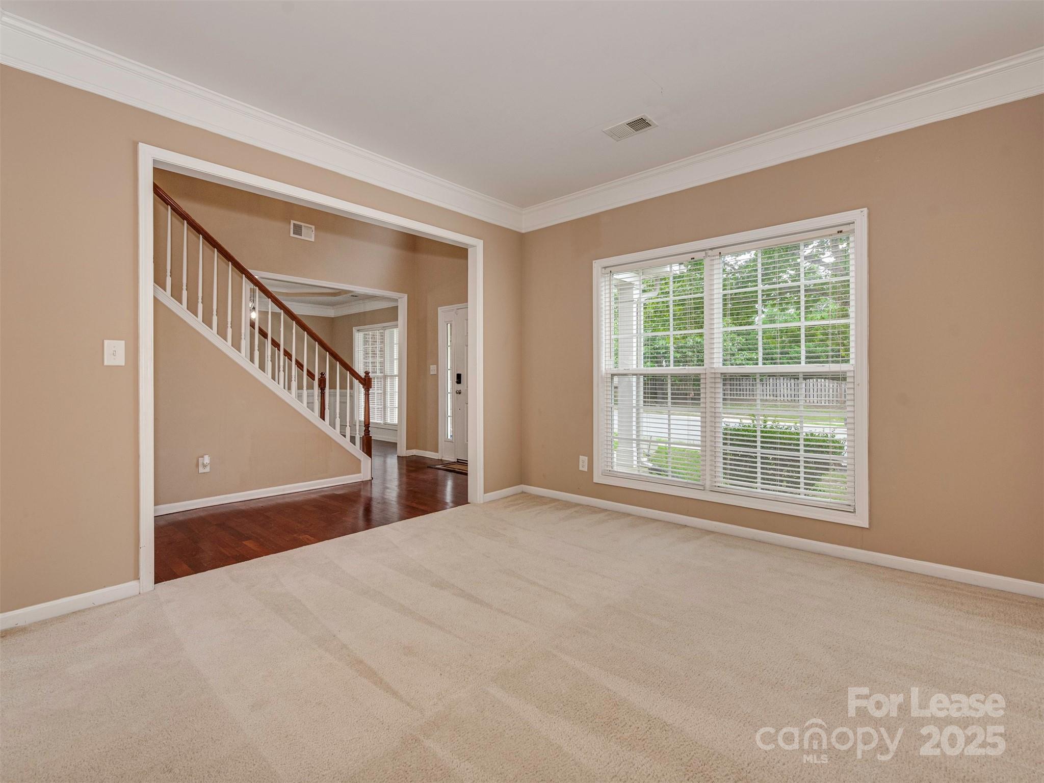 5607 Fulton Ridge Drive Indian Trail, NC 28079 - Photo 5 of 27 a view of an empty room with a window