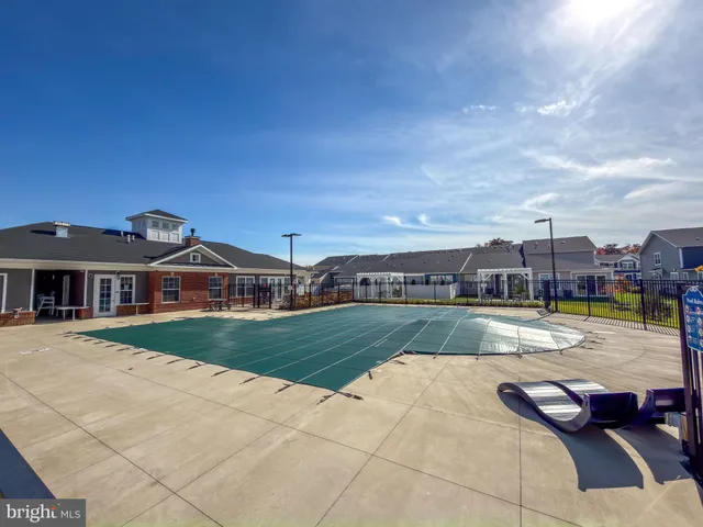 a view of a house with swimming pool