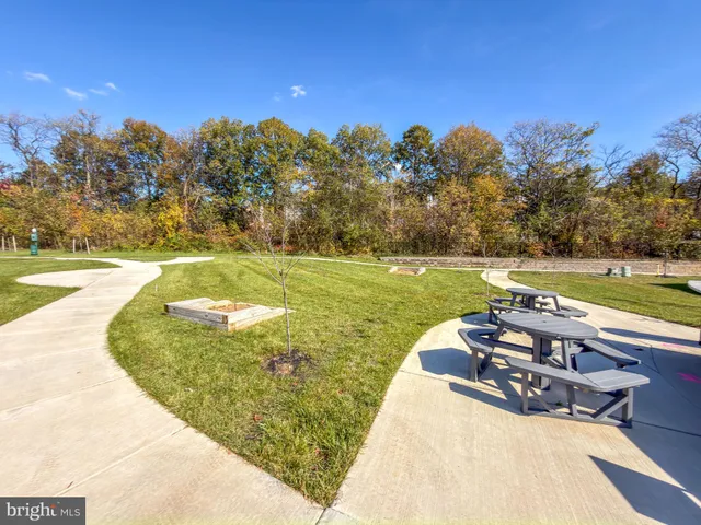 a view of a swimming pool with a yard