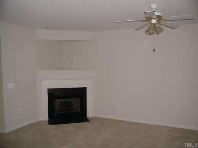 2403 Gaheris Court Raleigh, NC 27614 - Photo 5 of 10 The 1st floor has 9' ceilings, a great fan and lots of light from french doors in kitchen. Other