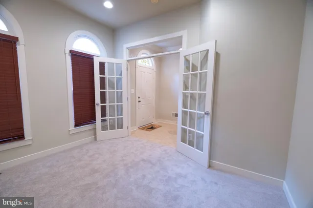 a bathroom with a sink a mirror and shower