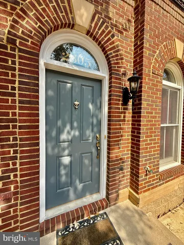 a view of a brick building with a door