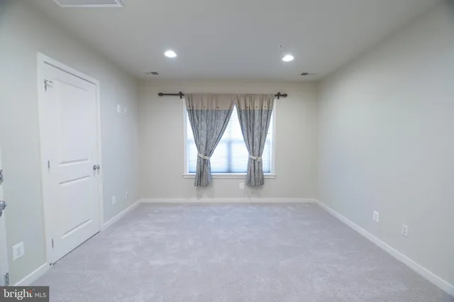 a view of a hallway with closet