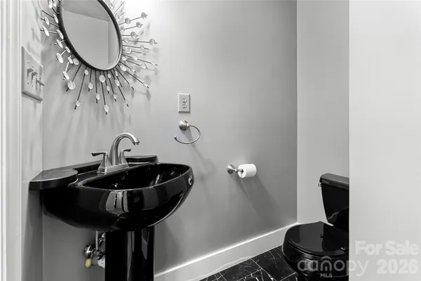 a close view of a sink and a mirror