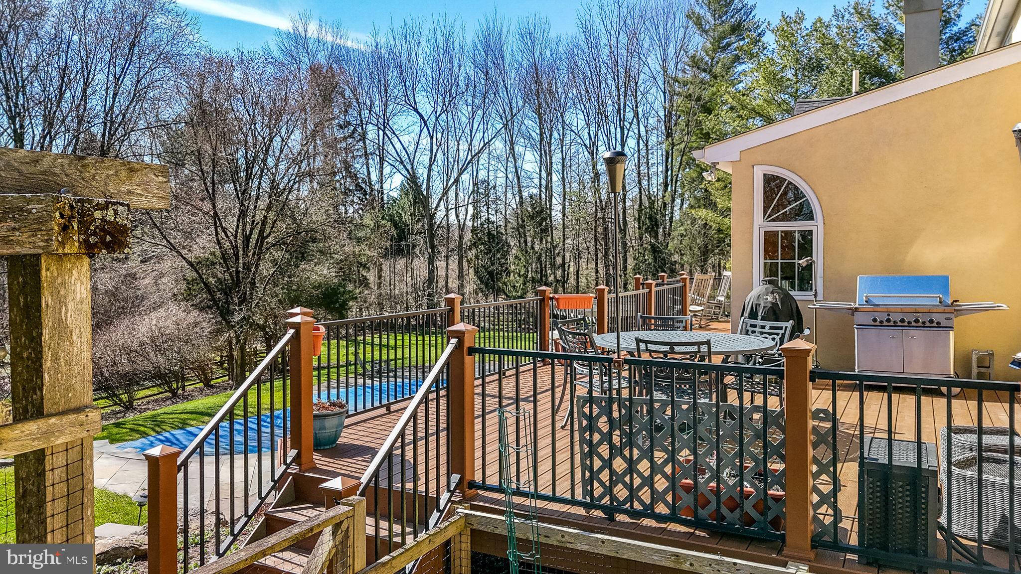 1450 Eaves Spring Drive Malvern, PA 19355 - Photo 11 of 58 side yard to deck