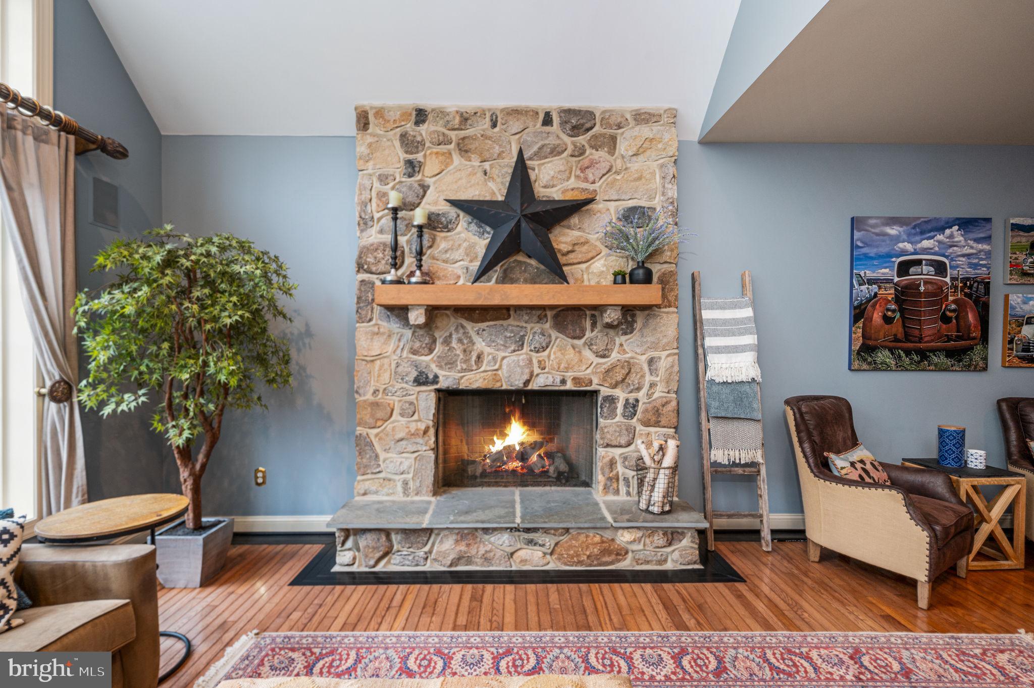 1450 Eaves Spring Drive Malvern, PA 19355 - Photo 29 of 58 stone fireplace in family room