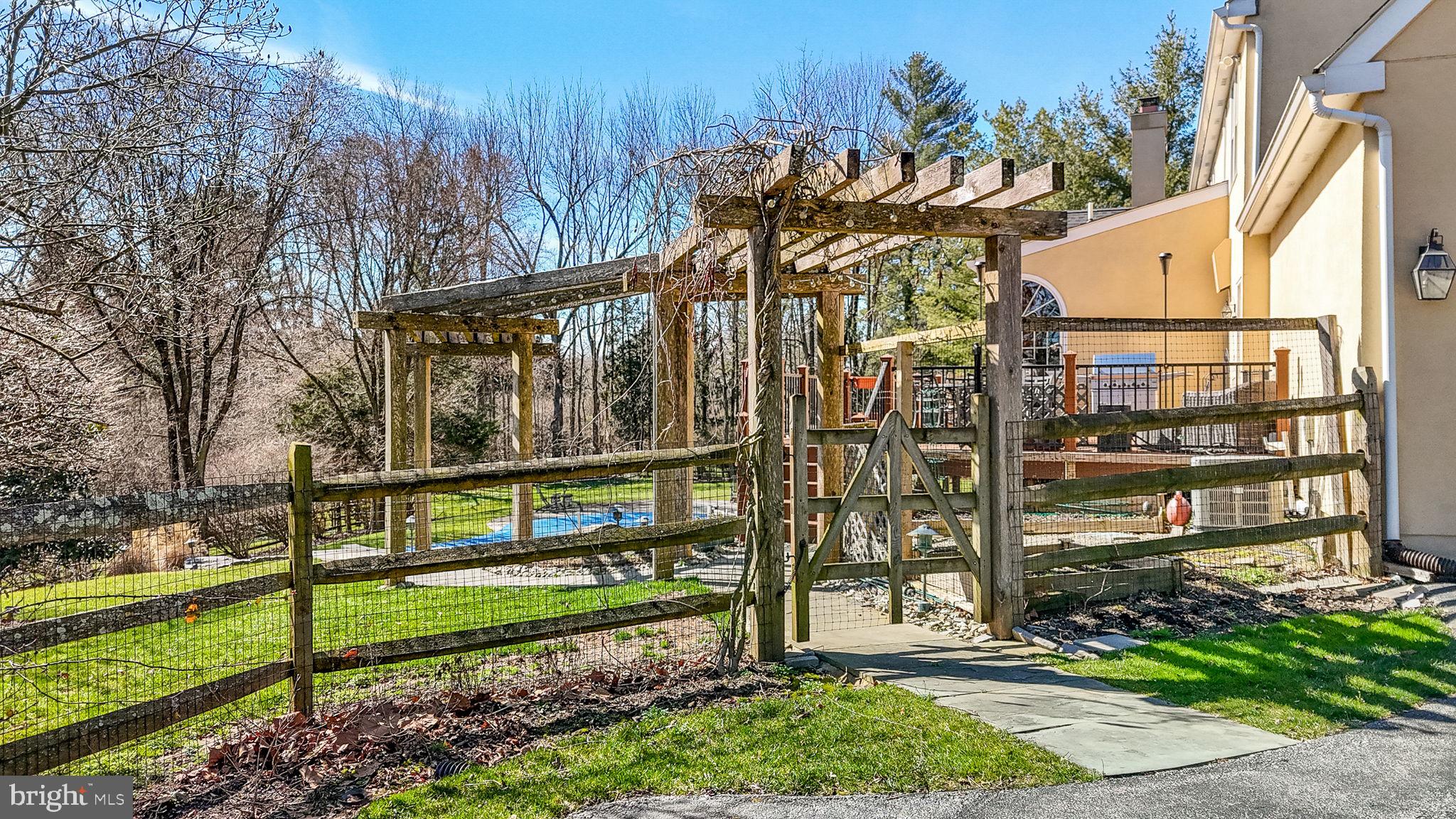 1450 Eaves Spring Drive Malvern, PA 19355 - Photo 10 of 58 side yard entrance