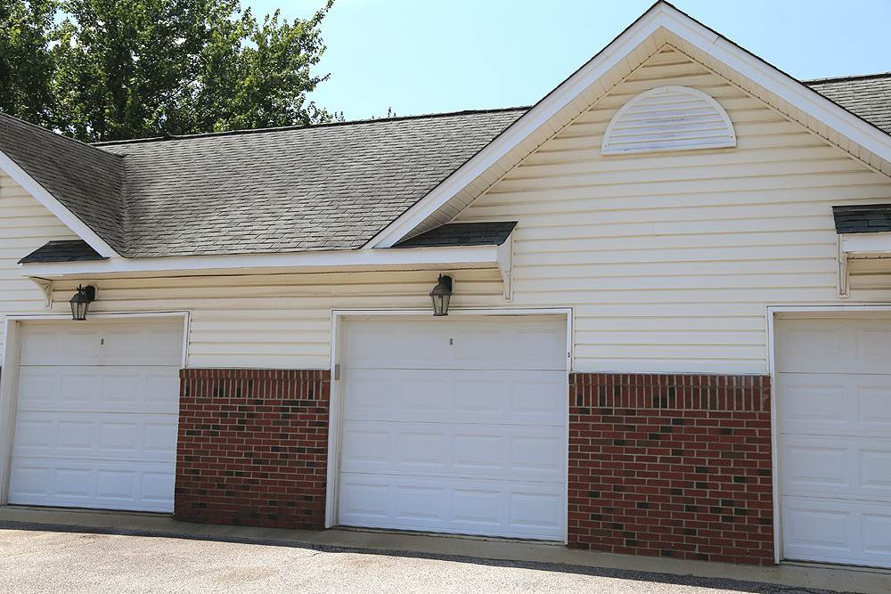 2041 Rivergate Road, Unit 103 Raleigh, NC 27614 - Photo 19 of 21 A rare-to-market 1-car garage is located directly across from the property. Additional parking available in front of building Garage