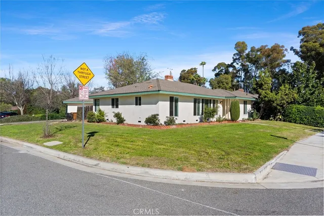 a view of a house with a swimming pool