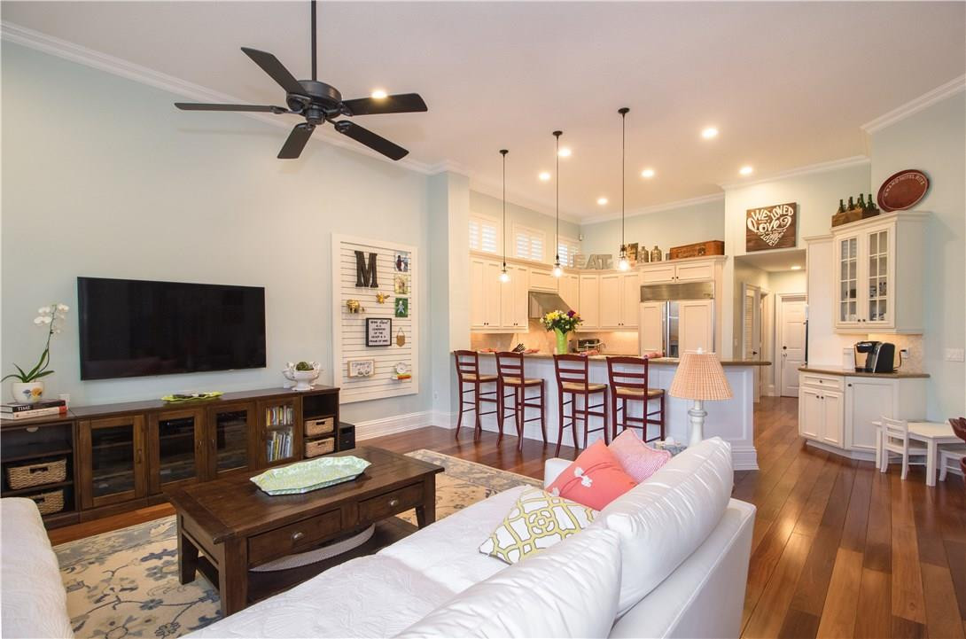 13841 Southwest 44th Street Davie, FL 33330 - Photo 11 of 40 a living room with furniture and a flat screen tv