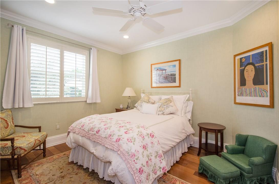 13841 Southwest 44th Street Davie, FL 33330 - Photo 21 of 40 a bedroom with a bed and a couch