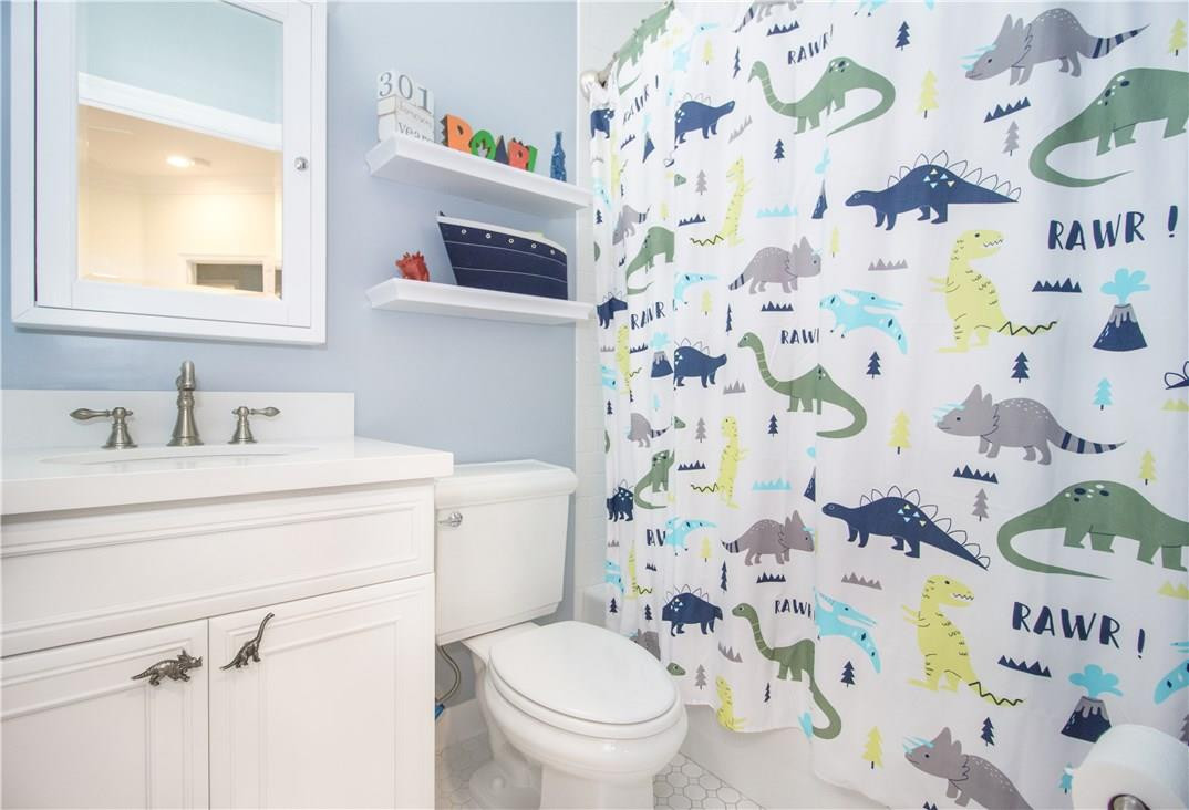 13841 Southwest 44th Street Davie, FL 33330 - Photo 26 of 40 a bathroom with a sink and a toilet