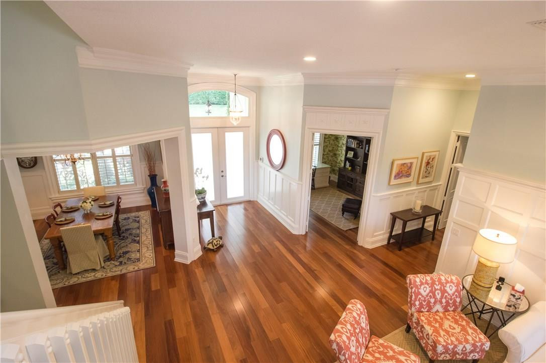 13841 Southwest 44th Street Davie, FL 33330 - Photo 3 of 40 a living room with furniture and a wooden floor