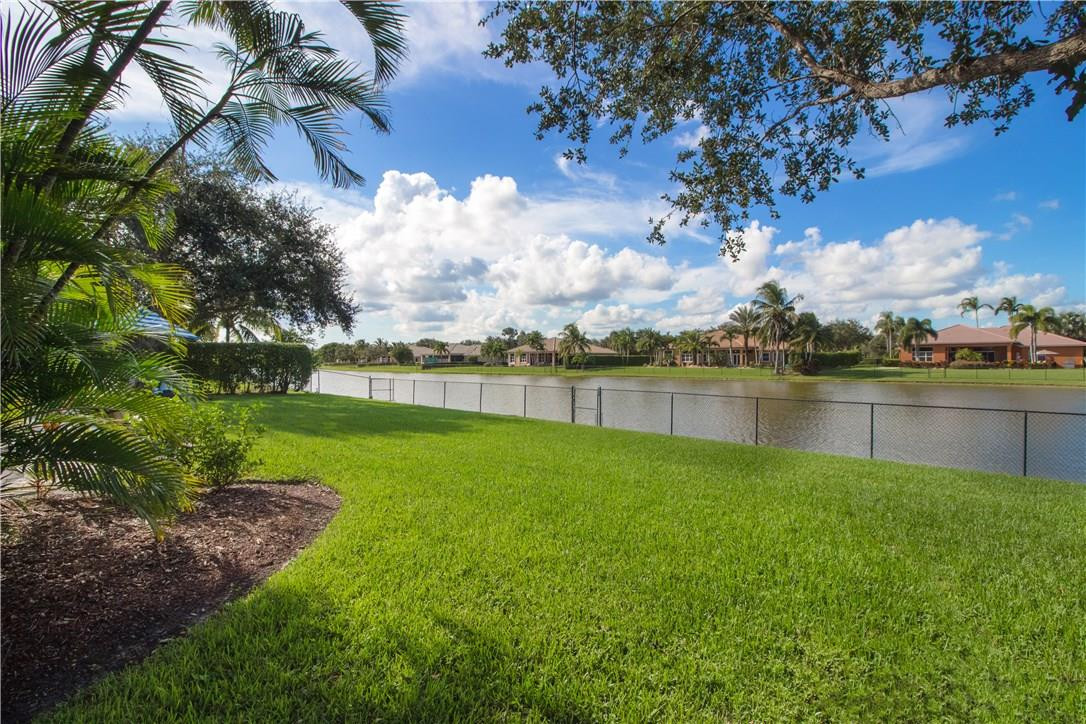 13841 Southwest 44th Street Davie, FL 33330 - Photo 34 of 40 a view of a lake with houses in the back
