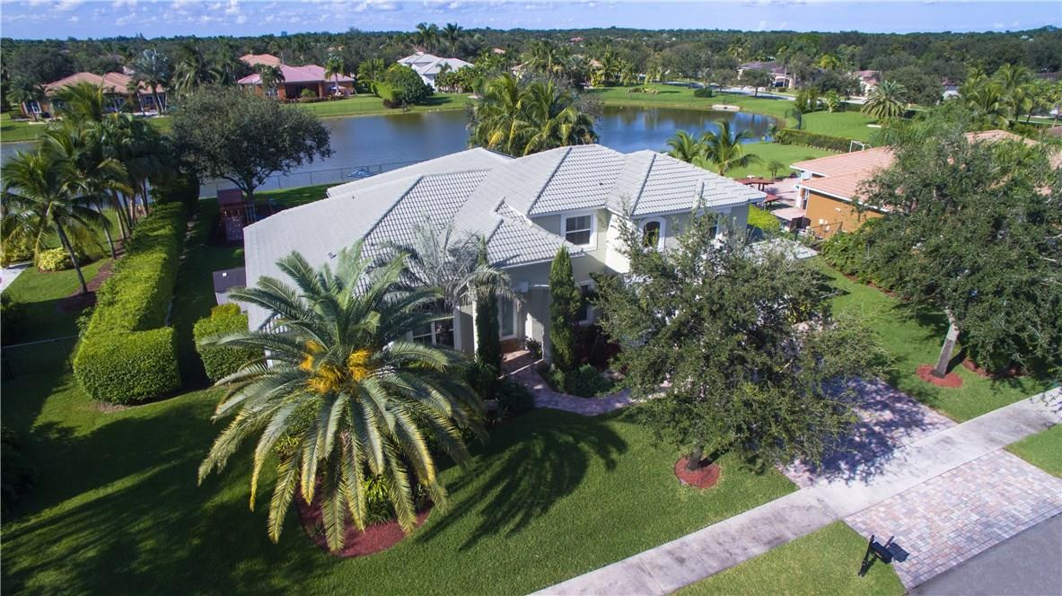 13841 Southwest 44th Street Davie, FL 33330 - Photo 35 of 40 an aerial view of residential houses with outdoor space and trees all around