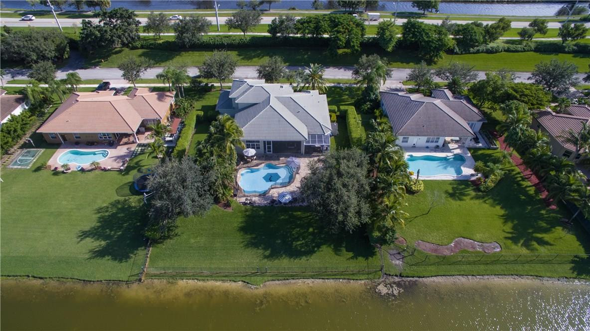 13841 Southwest 44th Street Davie, FL 33330 - Photo 37 of 40 an aerial view of residential house with outdoor space and lake view