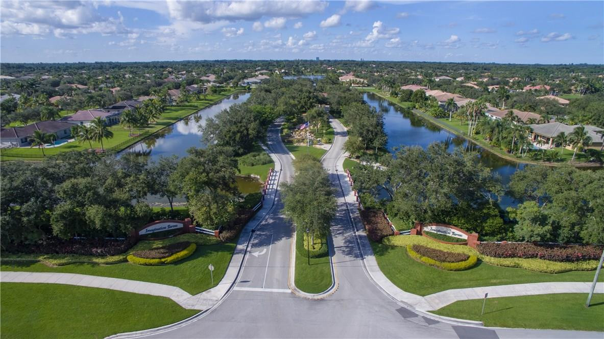 13841 Southwest 44th Street Davie, FL 33330 - Photo 40 of 40 an aerial view of a house with a garden and lake view