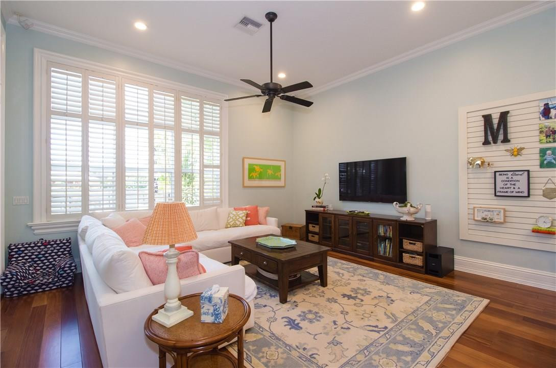 13841 Southwest 44th Street Davie, FL 33330 - Photo 9 of 40 a living room with furniture and a flat screen tv
