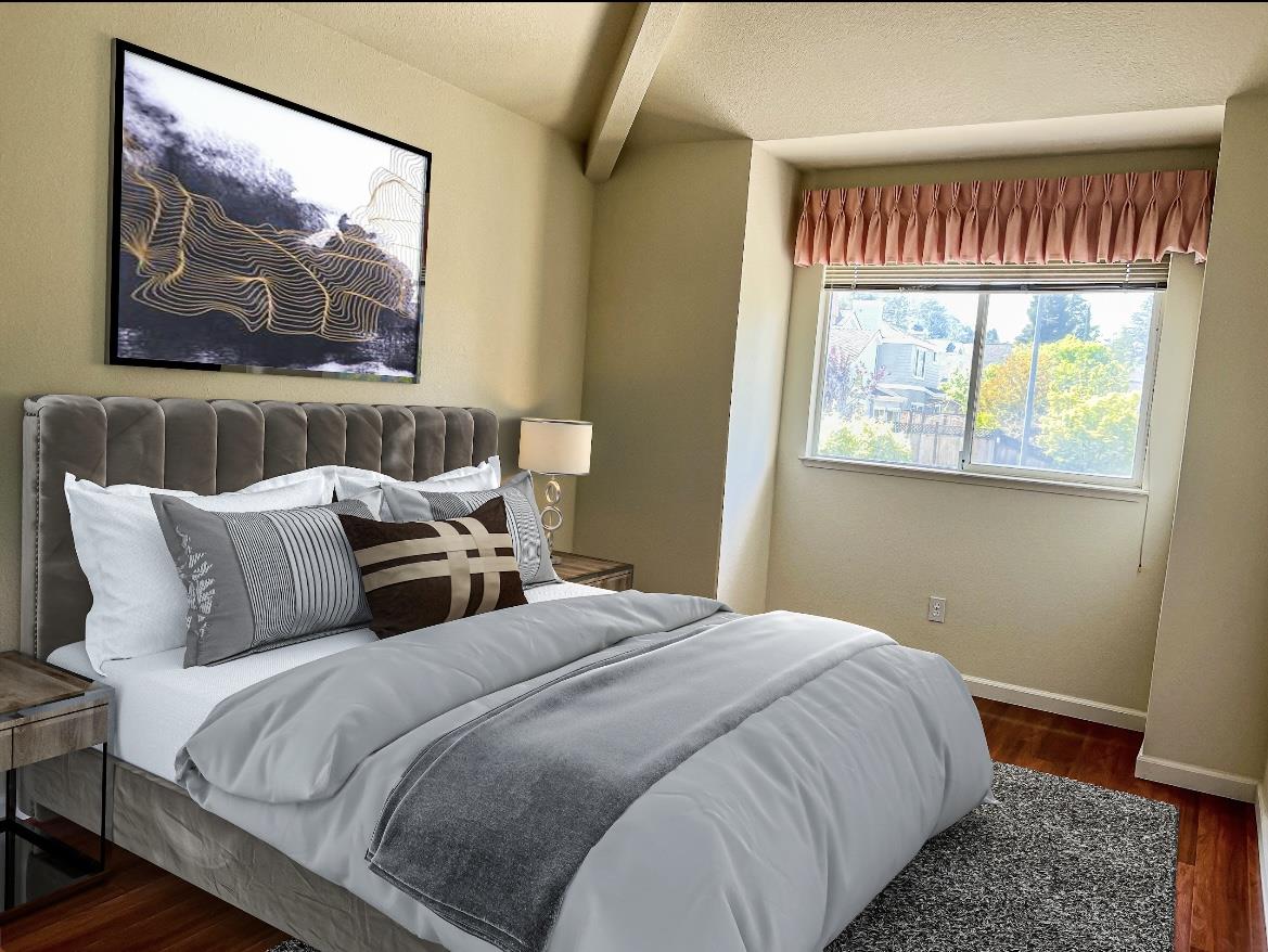 11792 Pine Brook Lane Cupertino, CA 95014 - Photo 11 of 19 a bedroom with bed and a painting on the wall