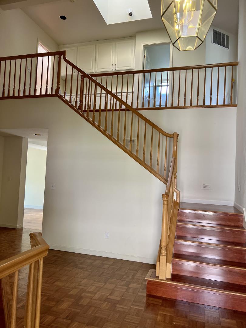 11792 Pine Brook Lane Cupertino, CA 95014 - Photo 7 of 19 a view of entryway with wooden floor
