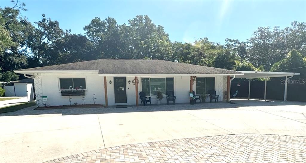 a front view of a house with a garage